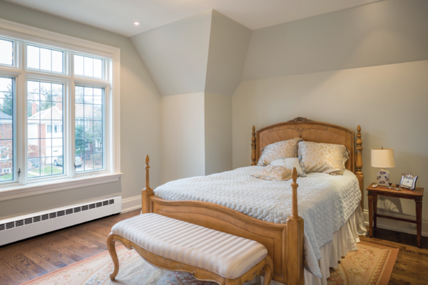 Revital/Line aluminum baseboard replacement cover in bedroom setting